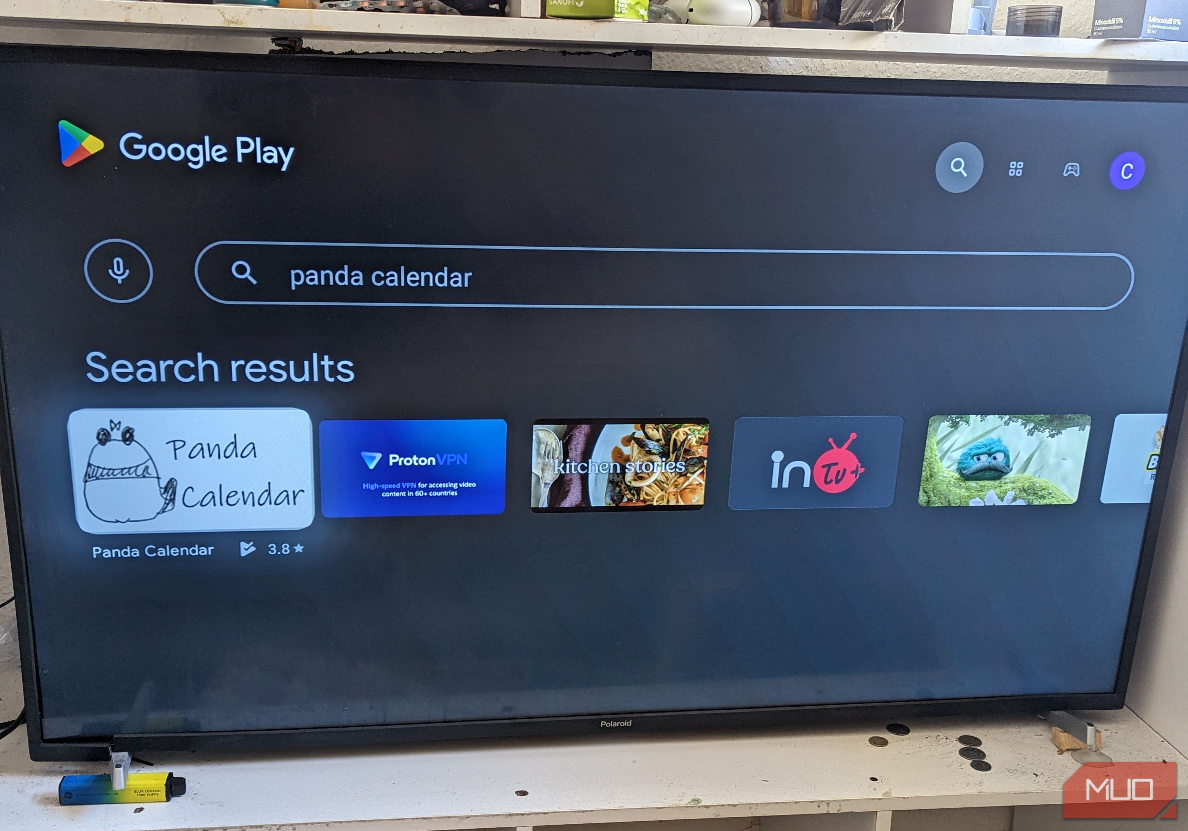 Android TV with Google Play Store search query to access Panda Calendar