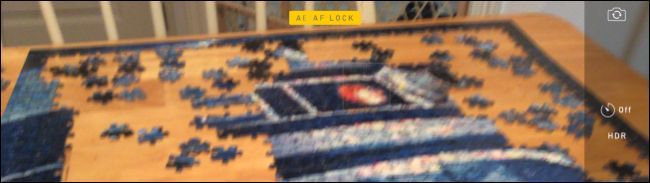 Сообщение AE/AF LOCK на экране iPhone