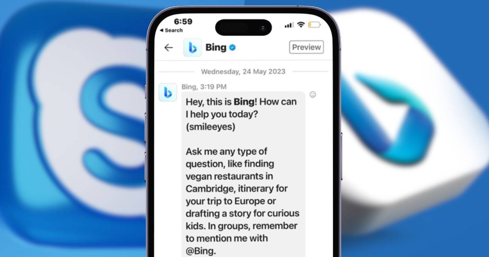 Bing Chat в Skype на смартфоне на фоне размытых логотипов Bing и Skype