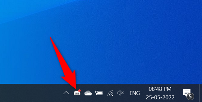 Иконка Discord в системном трее Windows.