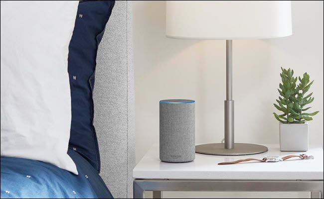 Amazon Echo on a nightstand.