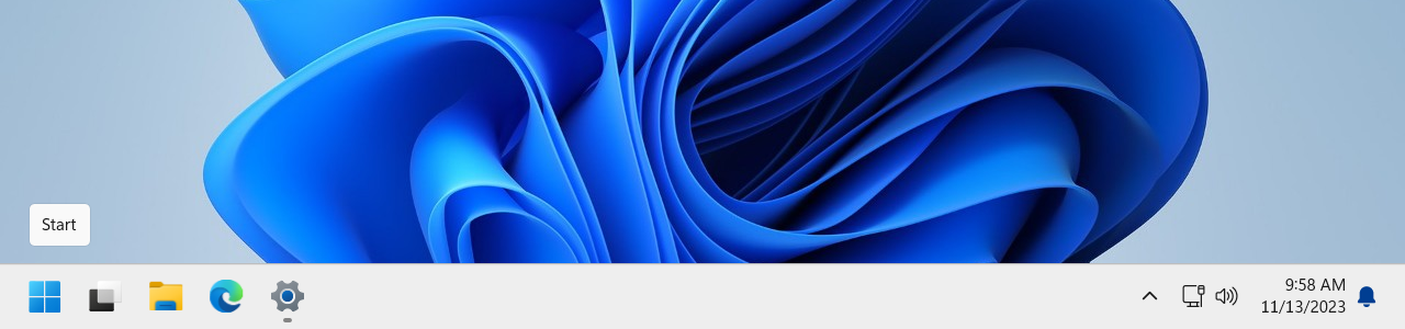 Панель задач Windows 11 с выровненными влево иконками