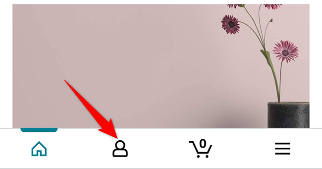 Найдите и нажмите иконку профиля в нижней панели мобильного приложения Amazon