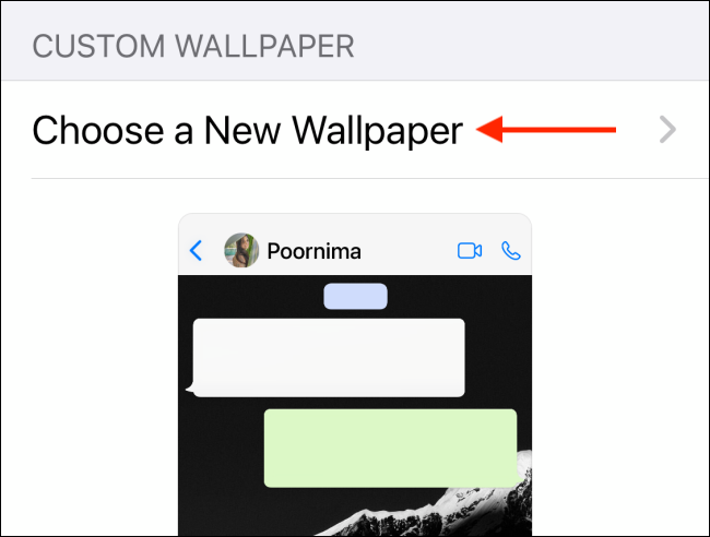 Кнопка «Выбрать новые обои» на iPhone