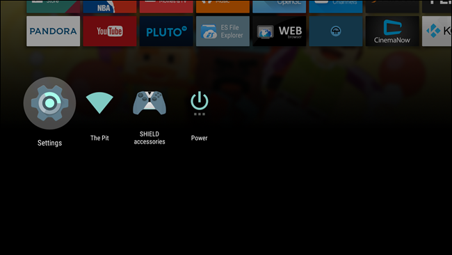 Главный экран Android TV с выделенным значком настроек