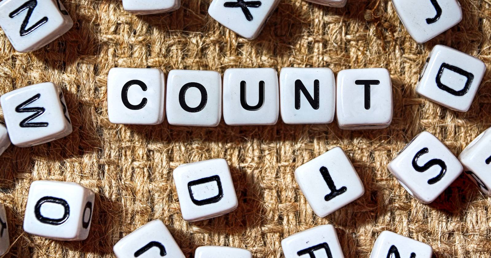 Блоки с буквами и надписью COUNT для иллюстрации подсчёта слов