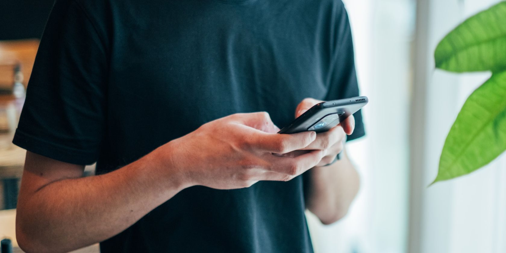 Person holding Android phone 