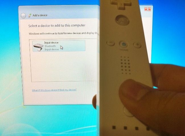Нажатие кнопок 1 и 2 на пульте Wii Remote