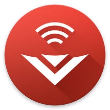 Смартфон с приложением SmartCast рядом с телевизором Vizio